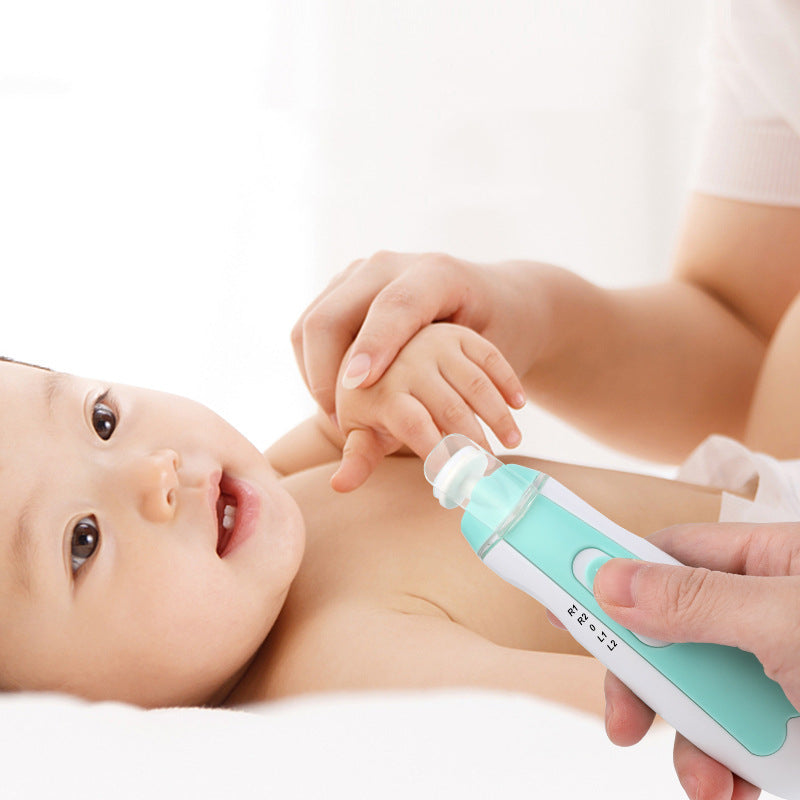 Baby receiving a skin check with a green and white device on a white background Baby Electric Nail trimmer