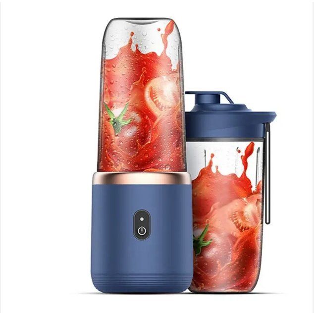 Blue portable blender with red juice splash design on a white background in kitchen