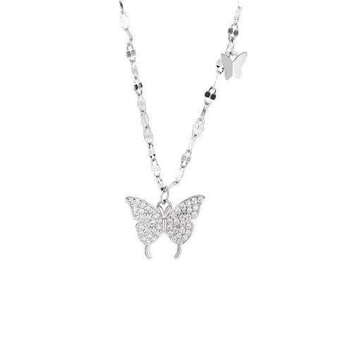 Butterfly necklace with clear stones on a white background