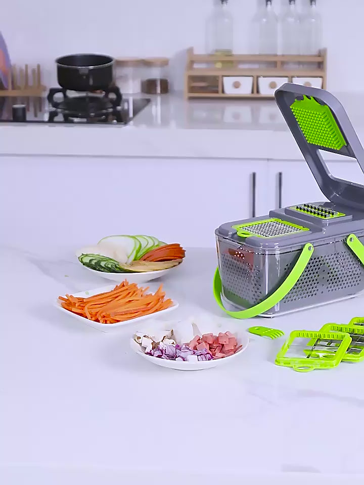 Vegetable grater with various vegetables on a kitchen counter