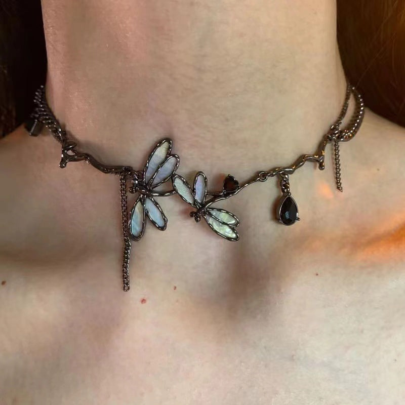 Butterfly anklet on a person's ankle necklace